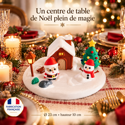 Centre de table village de Noël sur une table dressée