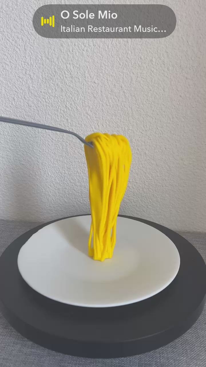 Assiette de spaghettis flottants